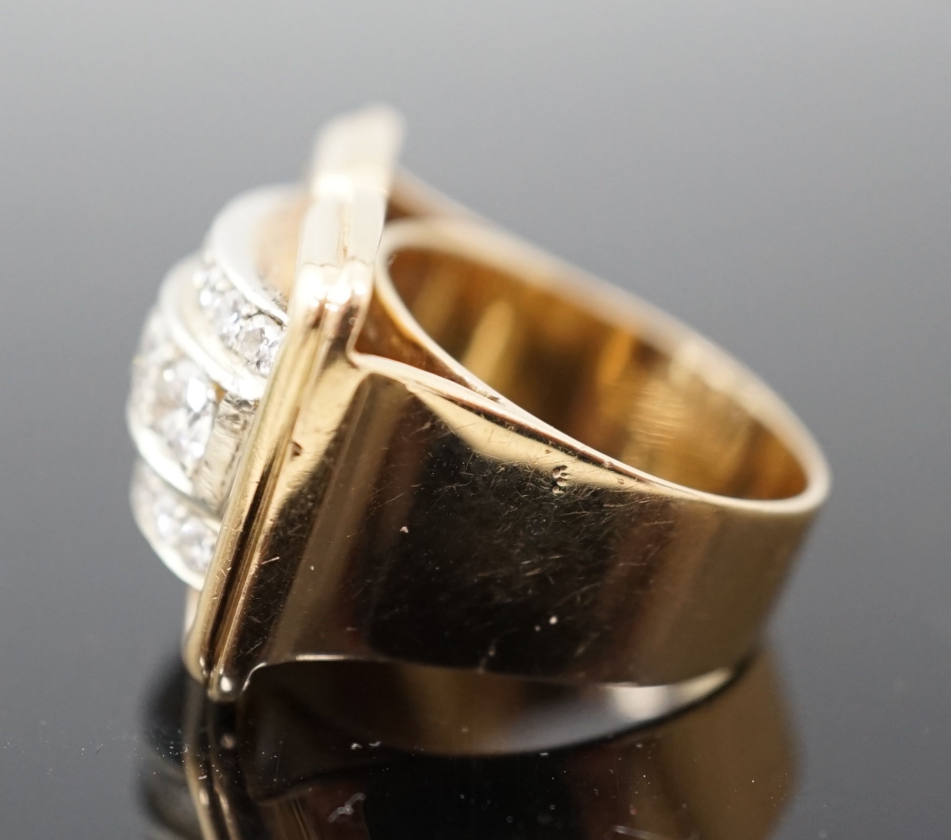 A mid 20th century gold and diamond cluster set rectangular dress ring